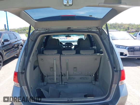 2010 Honda Odyssey EX with VIN 5FNRL3H44AB059711, listed as a IAAI auction lot 42057760 with 225,486 mi miles and . Bid and sale history available at DreamBid. Image 18.