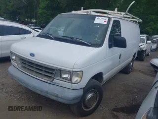 1993 Ford Econoline Cargo with VIN 1FTJE34H2PHA67802, listed as a IAAI auction lot 42127936 with 263,379 mi miles and . Bid and sale history available at DreamBid. Image 2.
