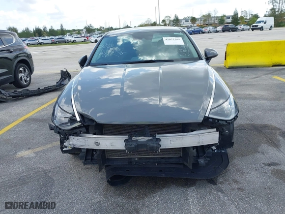 2023 Hyundai Sonata SEL with VIN KMHL64JA0PA270047, listed as a IAAI auction lot 42022365 with 57,904 mi miles. Bid and sale history available at carsss.com. Image 13.