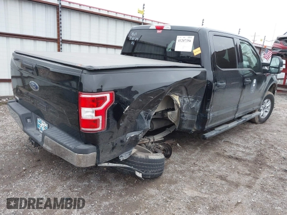 2018 Ford F-150 XL with VIN 1FTEW1EB0JKD85702, listed as a IAAI auction lot 41207356 with 136,528 mi miles. Bid and sale history available at carsss.com. Image 4.