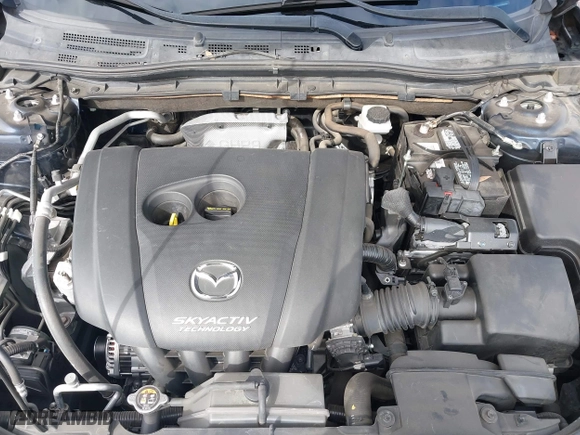 2016 Mazda Mazda3 i Grand Touring with VIN JM1BM1N74G1319656, listed as a IAAI auction lot 41561603 with 123,610 mi miles. Bid and sale history available at carsss.com. Image 10.