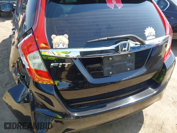 2015 Honda Fit EX-L z VIN 3HGGK5H85FM717646, wystawiony jako IAAI lot #42483387 z przebiegiem 137 296 mil mil oraz . Historia ofert i sprzedaży dostępna na DreamBid. Obrazek 19.