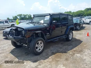 2008 Jeep Wrangler Unlimited Sahara with VIN 1J4GA59128L608515, listed as a IAAI auction lot 42627584 with 157,821 mi miles and . Bid and sale history available at DreamBid. Image 2.