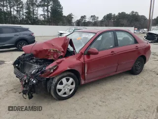 2009 Kia Spectra EX with VIN KNAFE222995661299, listed as a Copart auction lot 45813955 with 0 mi miles and Salvage Title. Bid and sale history available at carsss.com. Image 1.