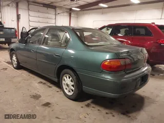 1998 Chevrolet Malibu LS with VIN 1G1NE52M6W6104642, listed as a IAAI auction lot 41636923 with 116,944 mi miles. Bid and sale history available at carsss.com. Image 3.