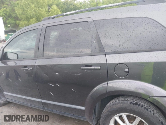 2017 Dodge Journey SXT with VIN 3C4PDCBG7HT588556, listed as a IAAI auction lot 42167063 with 149,397 mi miles and . Bid and sale history available at DreamBid. Image 14.