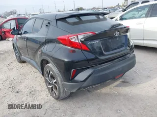 2018 Toyota C-HR XLE with VIN NMTKHMBX9JR001731, listed as a IAAI auction lot 41835918 with 138,087 mi miles. Bid and sale history available at carsss.com. Image 3.