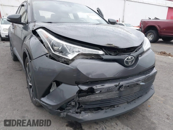 2019 Toyota C-HR XLE with VIN JTNKHMBX5K1035676, listed as a IAAI auction lot 41161562 with 185,962 mi miles. Bid and sale history available at carsss.com. Image 6.