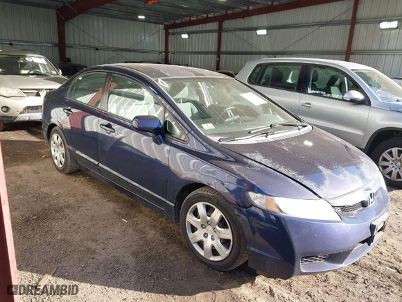 2009 Honda Civic Sdn LX with VIN 2HGFA16559H544472, listed as a IAAI auction lot 41695513 with 124,845 mi miles. Bid and sale history available at carsss.com. Image 1.