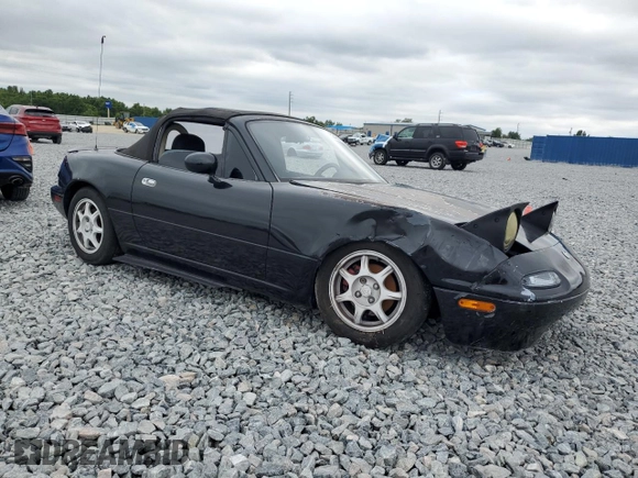 1994 Mazda MX-5 Miata with VIN JM1NA3534R0513305, listed as a Copart auction lot 52489865 with 150,481 mi miles and Salvage title. Bid and sale history available at DreamBid. Image 4.