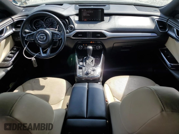 2016 Mazda CX-9 Grand Touring with VIN JM3TCBDY0G0116686, listed as a Copart auction lot 54077335 with 142,670 mi miles and Salvage title. Bid and sale history available at DreamBid. Image 8.
