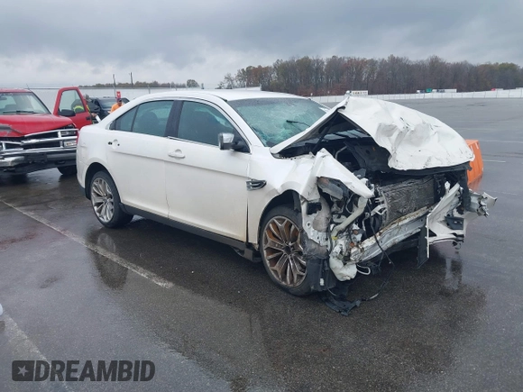 2014 Ford Taurus Limited with VIN 1FAHP2F80EG183153, listed as a IAAI auction lot 40860378 with 163,294 mi miles. Bid and sale history available at carsss.com. Image 1.