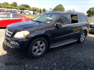 2011 Mercedes-Benz GL-Class GL 450 with VIN 4JGBF7BEXBA660757, listed as a Copart auction lot 69501904 with 150,468 mi miles and Salvage Title. Bid and sale history available at carsss.com. Image 1.