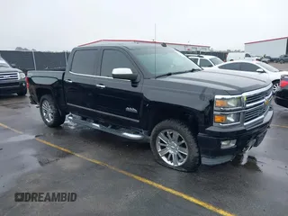 2014 Chevrolet Silverado 1500 High Country with VIN 3GCUKTECXEG311146, listed as a IAAI auction lot 41468424 with 187,089 mi miles. Bid and sale history available at carsss.com. Image 1.