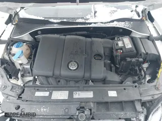 2012 Volkswagen Passat SE with VIN 1VWBP7A35CC052679, listed as a IAAI auction lot 41268199 with 125,691 mi miles. Bid and sale history available at carsss.com. Image 10.