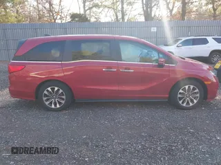 2022 Honda Odyssey EX-L with VIN 5FNRL6H73NB034607, listed as a IAAI auction lot 41238103 with 57,868 mi miles and . Bid and sale history available at DreamBid. Image 13.