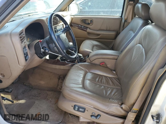1999 Oldsmobile Bravada z VIN 1GHDT13W8X2717155, wystawiony jako Copart lot #84807244 z przebiegiem 144 805 mil mil oraz Szkoda całkowita • Salvage title. Historia ofert i sprzedaży dostępna na DreamBid. Obrazek 7.