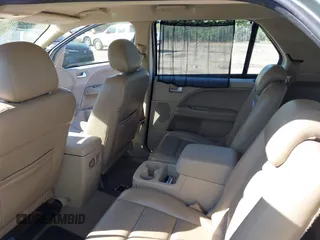 2005 Ford Freestyle SEL with VIN 1FMZK021X5GA46212, listed as a IAAI auction lot 41779597 with 147,994 mi miles. Bid and sale history available at carsss.com. Image 8.