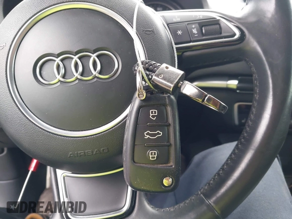 2015 Audi A3 Premium Plus z VIN WAUEFGFF7F1057529, wystawiony jako IAAI lot #42230483 z przebiegiem 110 344 mil mil oraz . Historia ofert i sprzedaży dostępna na DreamBid. Obrazek 11.