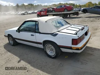 1989 Ford Mustang with VIN 1FABP44A5KF214843, listed as a Copart auction lot 74890984 with 65,601 mi miles and Clean title. Bid and sale history available at DreamBid. Image 2.