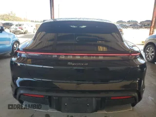2022 Porsche Taycan 4 z VIN WP0BA2Y11NSA67171, wystawiony jako Copart lot #59885844 z przebiegiem 22 760 mil mil oraz Szkoda całkowita • Salvage title. Historia ofert i sprzedaży dostępna na DreamBid. Obrazek 6.