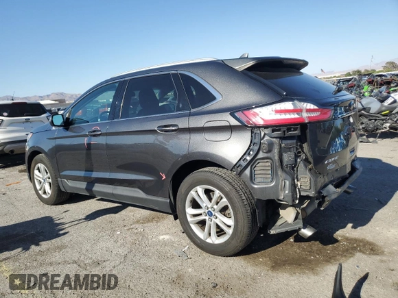 2020 Ford Edge SEL with VIN 2FMPK4J94LBA44997, listed as a Copart auction lot 57360895 with 69,212 mi miles and Salvage title. Bid and sale history available at DreamBid. Image 2.