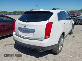 2016 Cadillac SRX Luxury Collection z VIN 3GYFNBE3XGS505311, wystawiony jako IAAI lot #42066399 z przebiegiem 87 132 mil mil oraz . Historia ofert i sprzedaży dostępna na DreamBid. Obrazek 4.