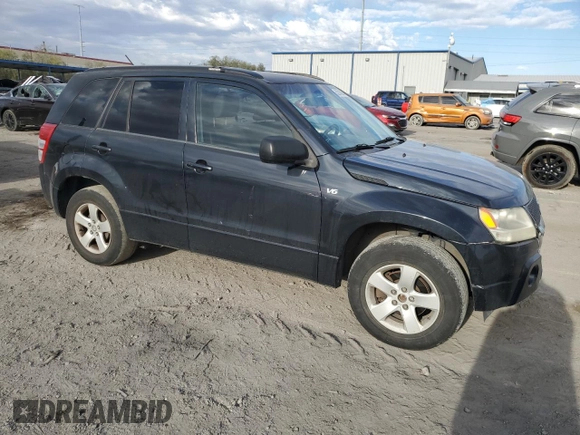 2007 Suzuki Grand Vitara XSport with VIN JS3TD944974201645, listed as a Copart auction lot 52810205 with 254,761 mi miles and Salvage title. Bid and sale history available at DreamBid. Image 4.