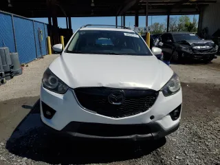 2014 Mazda CX-5 Grand Touring with VIN JM3KE4DY6E0363211, listed as a Copart auction lot 48352315 with 214,298 mi miles and Salvage Title. Bid and sale history available at DreamBid. Image 5.