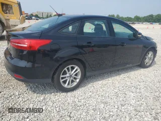 2016 Ford Focus SE with VIN 1FADP3F22GL233402, listed as a Copart auction lot 60854175 with 77,002 mi miles and Salvage title. Bid and sale history available at DreamBid. Image 3.