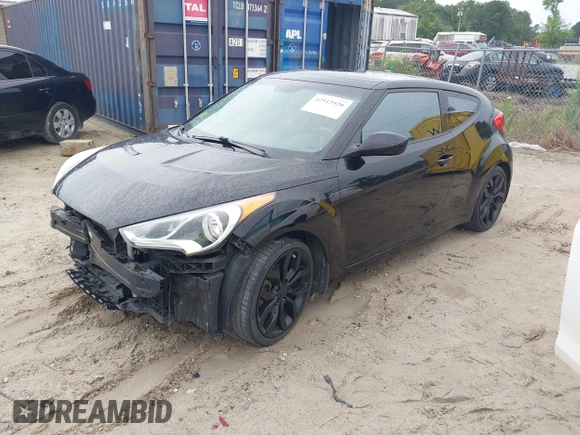 2013 Hyundai Veloster w/Black Int with VIN KMHTC6AD3DU084995, listed as a IAAI auction lot 42513920 with 103,595 mi miles and . Bid and sale history available at DreamBid. Image 2.