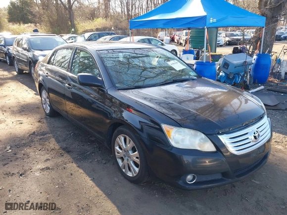 2008 Toyota Avalon XL with VIN 4T1BK36BX8U264663, listed as a IAAI auction lot 41984309 with 92,177 mi miles. Bid and sale history available at carsss.com. Image 1.
