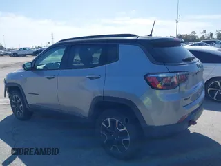 2019 Jeep Compass Trailhawk with VIN 3C4NJDDBXKT627350, listed as a IAAI auction lot 41803263 with 63,768 mi miles and . Bid and sale history available at DreamBid. Image 14.