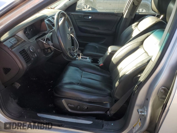 2009 Cadillac DTS 1SC z VIN 1G6KD57Y89U105190, wystawiony jako Copart lot #77560874 z przebiegiem 166 134 mil mil oraz Szkoda całkowita • Salvage title. Historia ofert i sprzedaży dostępna na DreamBid. Obrazek 7.