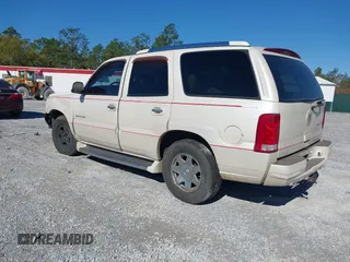 2004 Cadillac Escalade с VIN 1GYEC63TX4R299594, выставлен на аукционе IAAI как лот 41833184 с пробегом 320 822 миль миль и . История ставок и продаж доступна на DreamBid. Изображение 3.