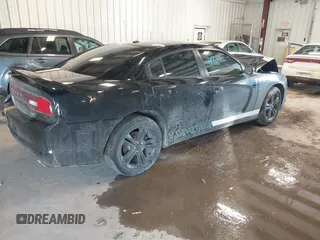 2014 Dodge Charger SXT with VIN 2C3CDXJG0EH296568, listed as a IAAI auction lot 41665615 with 114,056 mi miles. Bid and sale history available at carsss.com. Image 4.