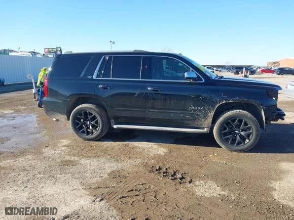 2015 Chevrolet Tahoe LTZ with VIN 1GNSCCKC4FR186632, listed as a IAAI auction lot 41482904 with 149,468 mi miles. Bid and sale history available at carsss.com. Image 14.