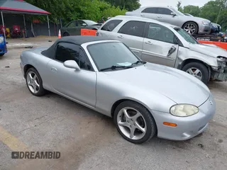2002 Mazda MX-5 Miata Cloth with VIN JM1NB353820229890, listed as a IAAI auction lot 42750045 with 116,227 mi miles and . Bid and sale history available at DreamBid. Image 1.