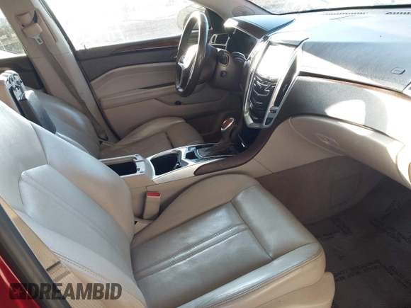 2014 Cadillac SRX Luxury Collection with VIN 3GYFNBE38ES596558, listed as a IAAI auction lot 41463404 with 109,524 mi miles. Bid and sale history available at carsss.com. Image 5.