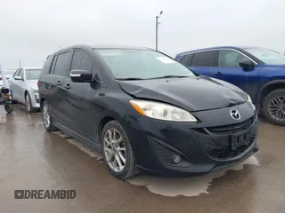 2014 Mazda 5 Grand Touring z VIN JM1CW2DL6E0175839, wystawiony jako IAAI lot #41344438 z przebiegiem 290 579 mil mil oraz . Historia ofert i sprzedaży dostępna na DreamBid. Obrazek 1.