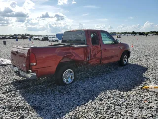 2000 Ford F-150 XL with VIN 1FTRX17W3YNB80866, listed as a Copart auction lot 61151005 with Not provided miles and Salvage title. Bid and sale history available at DreamBid. Image 3.