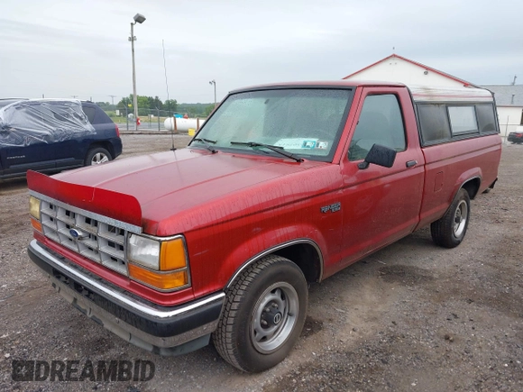 1992 Ford Ranger XLT z VIN 1FTCR10X8NUC56232, wystawiony jako IAAI lot #42307915 z przebiegiem 76 475 mil mil oraz . Historia ofert i sprzedaży dostępna na DreamBid. Obrazek 2.