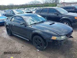 2004 Ford Mustang Standard with VIN 1FAFP40614F176095, listed as a IAAI auction lot 41907117 with 217,072 mi miles. Bid and sale history available at carsss.com. Image 1.
