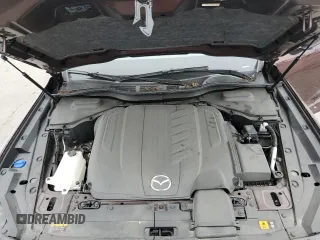 2024 Mazda CX-90 Premium z VIN JM3KKDHD8R1113467, wystawiony jako Copart lot #59140195 z przebiegiem 10 267 mil mil oraz Szkody całkowita. Historia ofert i sprzedaży dostępna na DreamBid. Obrazek 12.