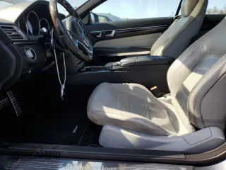2016 Mercedes-Benz E 400 with VIN WDDKJ6HB3GF321767, listed as a Copart auction lot 61826015 with 76,314 mi miles and Salvage title. Bid and sale history available at DreamBid. Image 7.