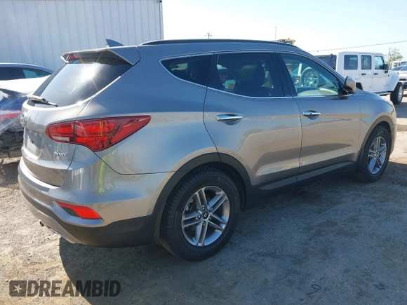 2017 Hyundai Santa Fe 2.4L z VIN 5XYZU3LB4HG446961, wystawiony jako IAAI lot #42214109 z przebiegiem 140 175 mil mil oraz . Historia ofert i sprzedaży dostępna na DreamBid. Obrazek 4.