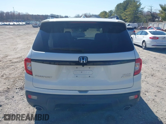2019 Honda Passport Elite z VIN 5FNYF8H04KB005307, wystawiony jako IAAI lot #41828725 z przebiegiem 61 864 mil mil oraz . Historia ofert i sprzedaży dostępna na DreamBid. Obrazek 16.