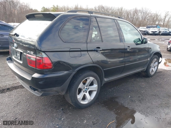 2006 BMW X5 4.4i with VIN 5UXFB53506LV22836, listed as a IAAI auction lot 41727708 with 186,084 mi miles. Bid and sale history available at carsss.com. Image 4.