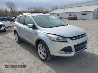 2013 Ford Escape Titanium with VIN 1FMCU9J90DUD54078, listed as a IAAI auction lot 42001028 with 202,820 mi miles and . Bid and sale history available at DreamBid. Image 1.