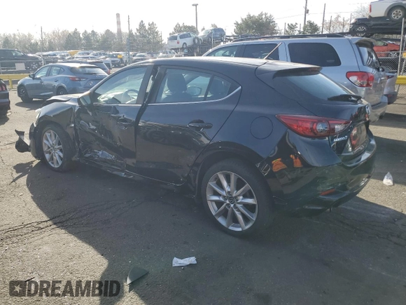 2017 Mazda 3 Touring with VIN 3MZBN1L7XHM102386, listed as a Copart auction lot 48802165 with 128,404 mi miles and Salvage Title. Bid and sale history available at carsss.com. Image 2.